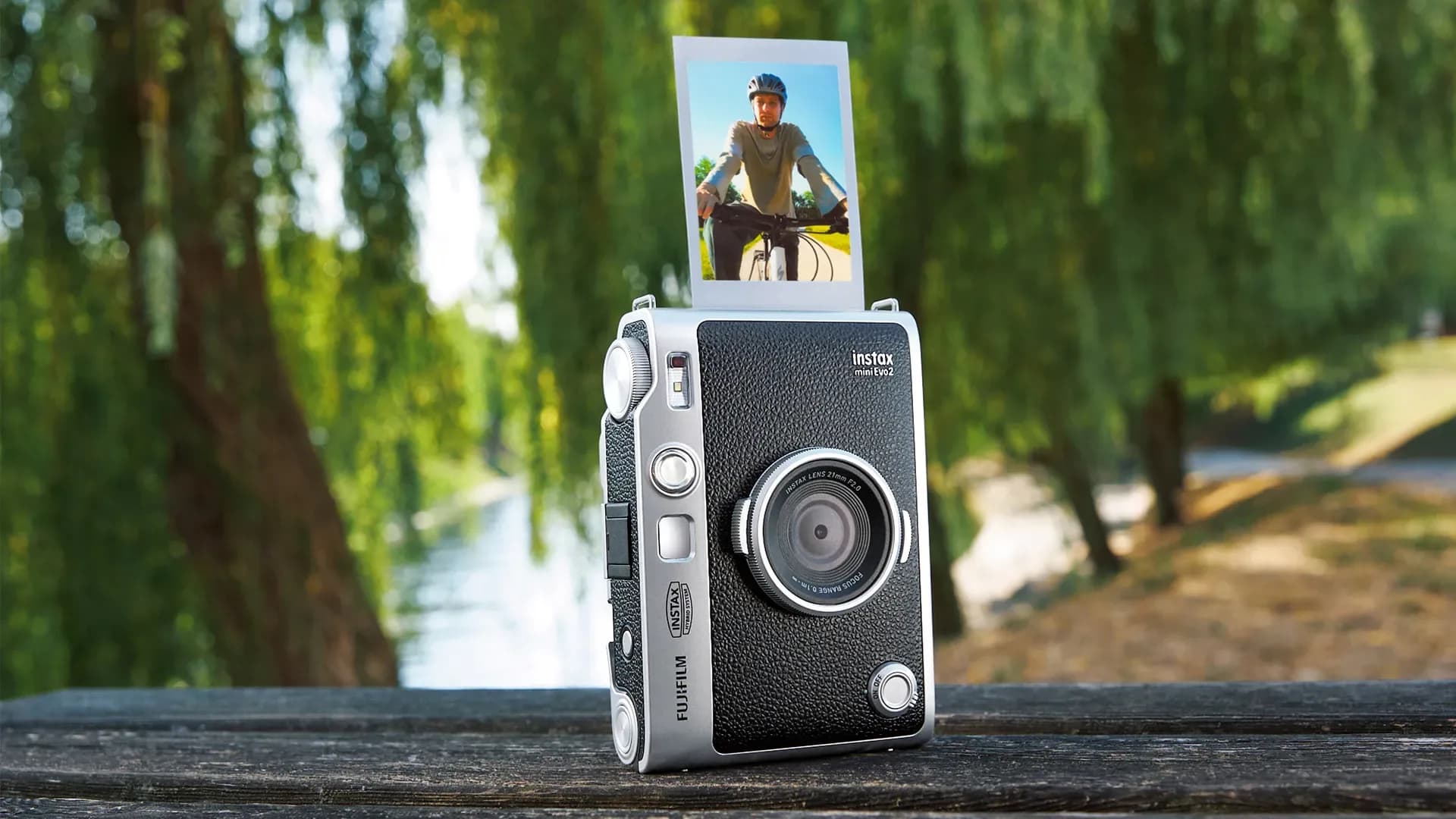 Fujifilm Instax Mini Evo 2 hybrid instant camera in black showing its full rear touchscreen