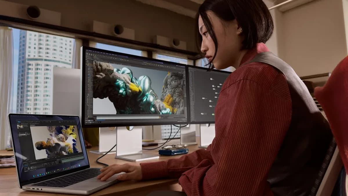 Apple's 14-inch MacBook Pro with M6 chip shown open on a desk