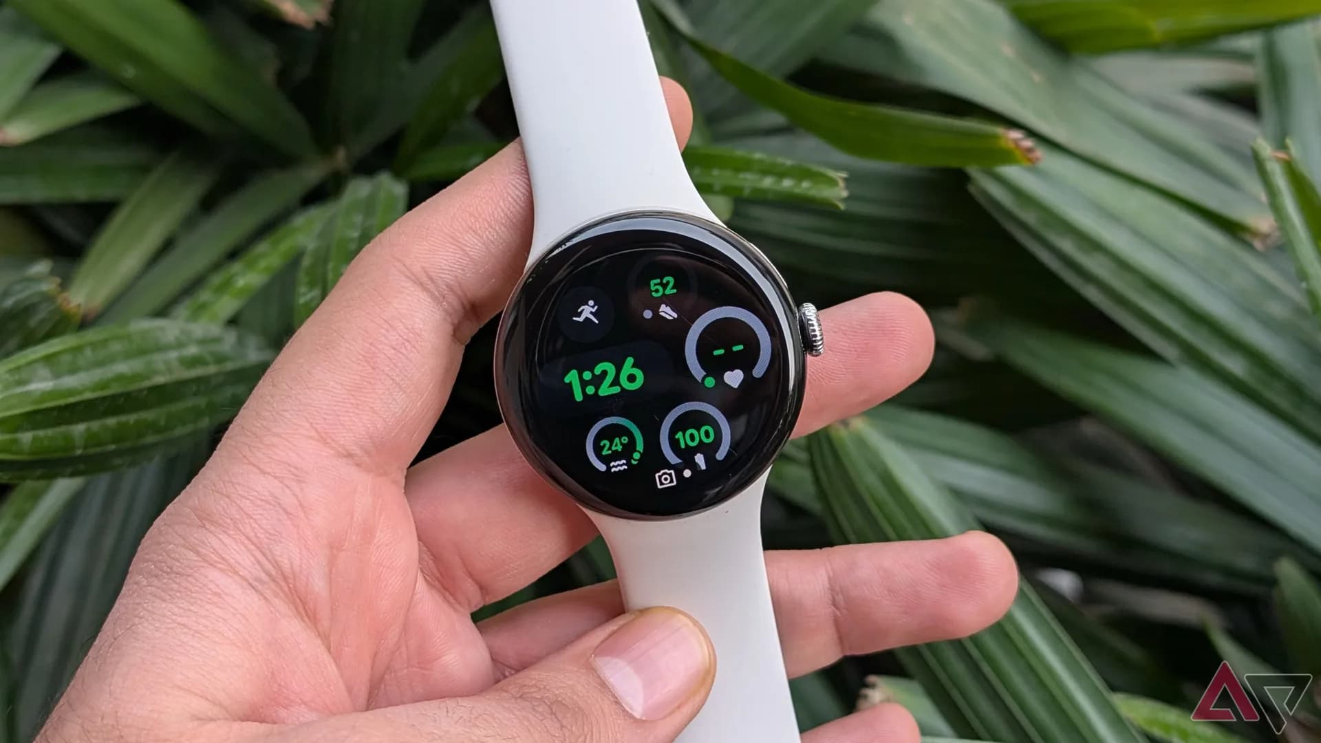 Google Pixel Watch displaying emergency features on its round touchscreen dial.