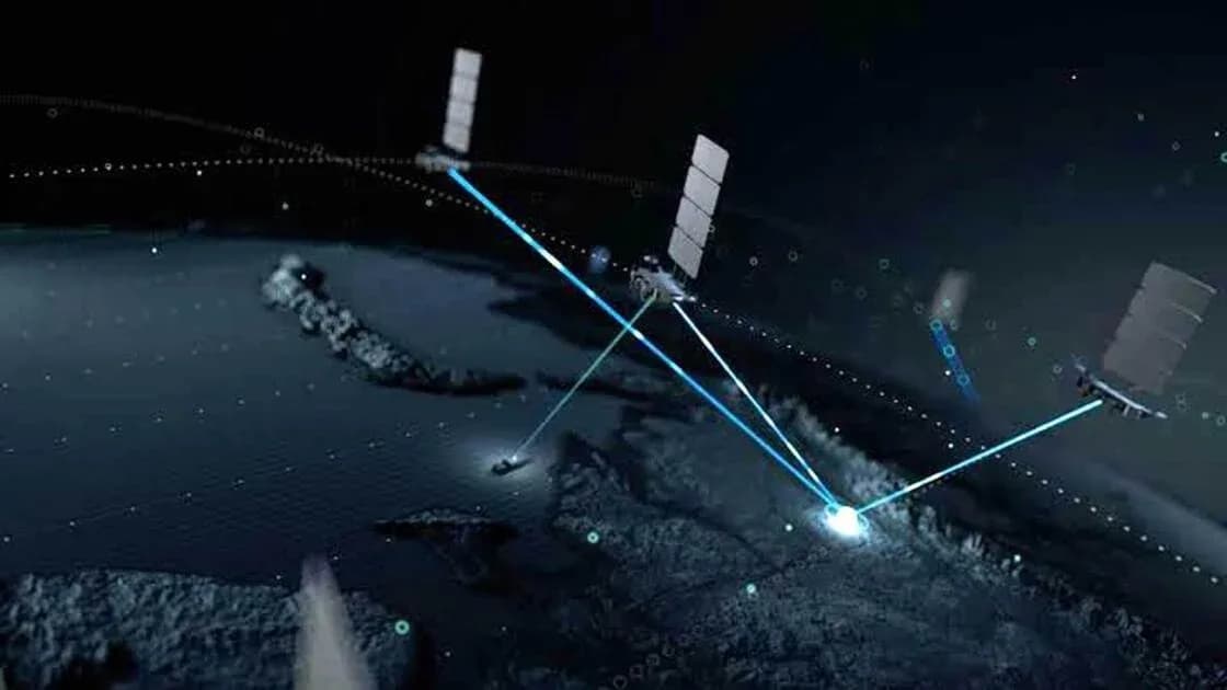 A satellite orbiting in low Earth orbit against the blue curve of Earth's atmosphere