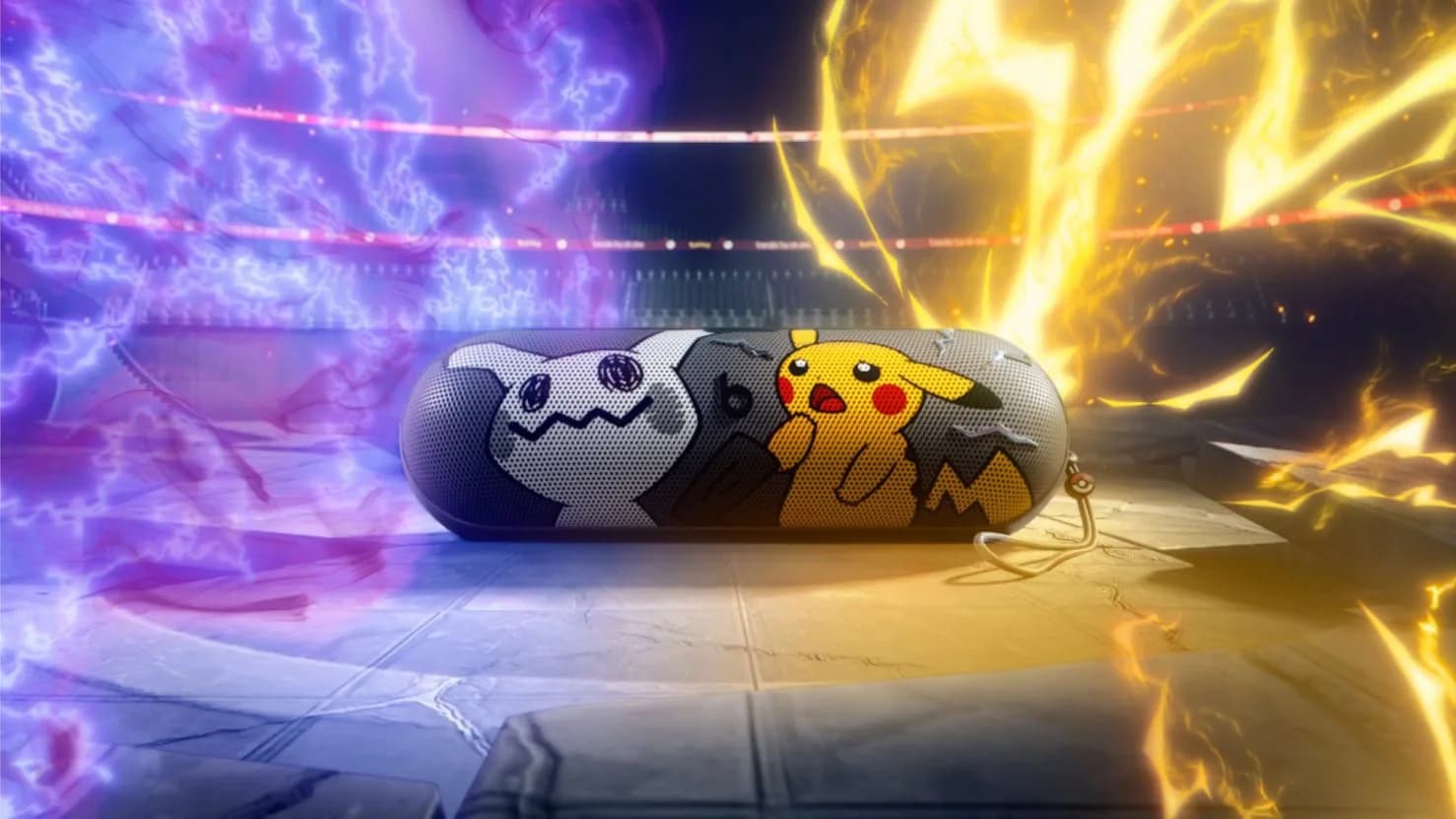 Beats Pill portable speaker featuring Pikachu and Mimikyu graphics on the metal front grille