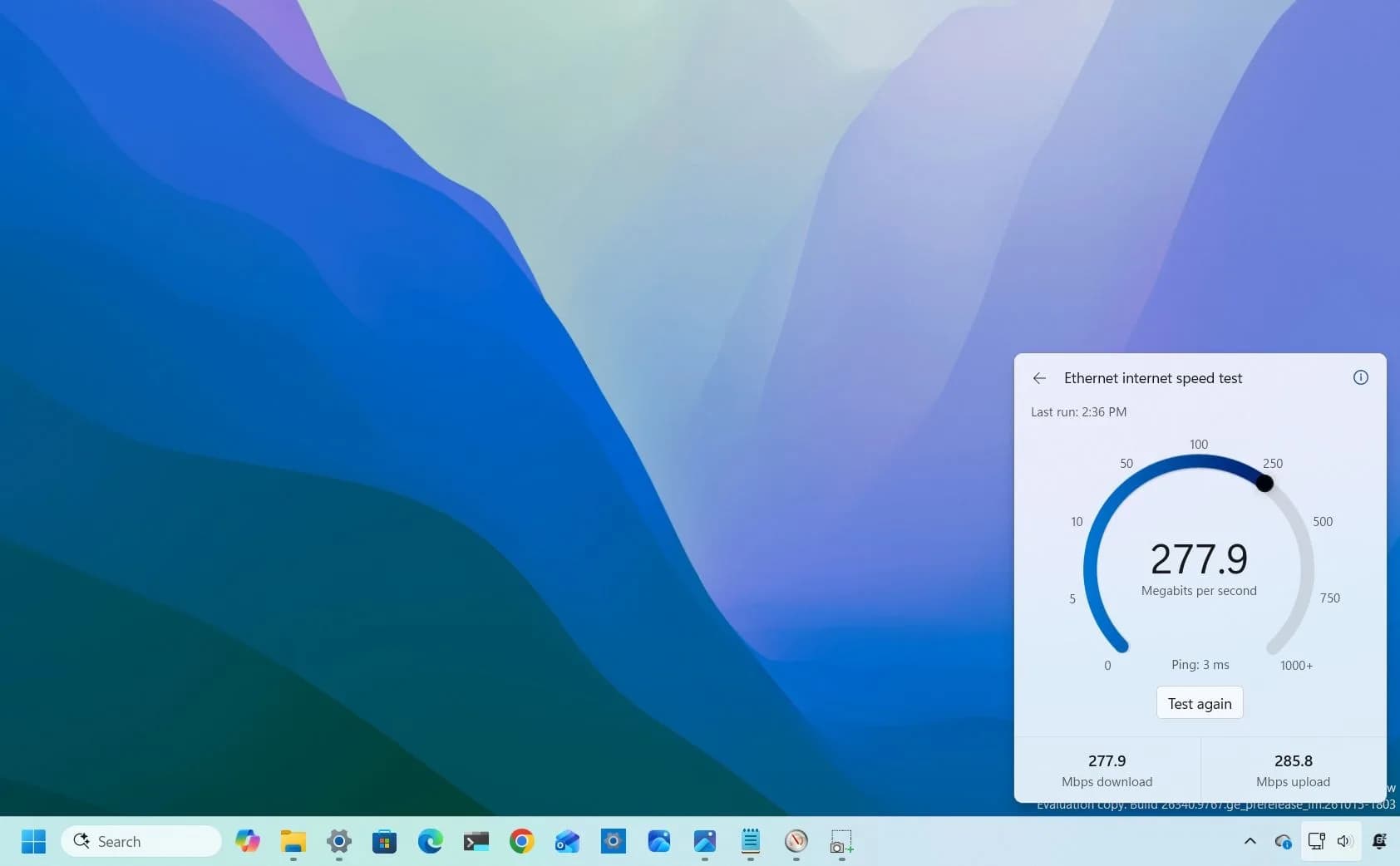 Windows 11 Quick Settings panel showing a new built-in internet speed test option