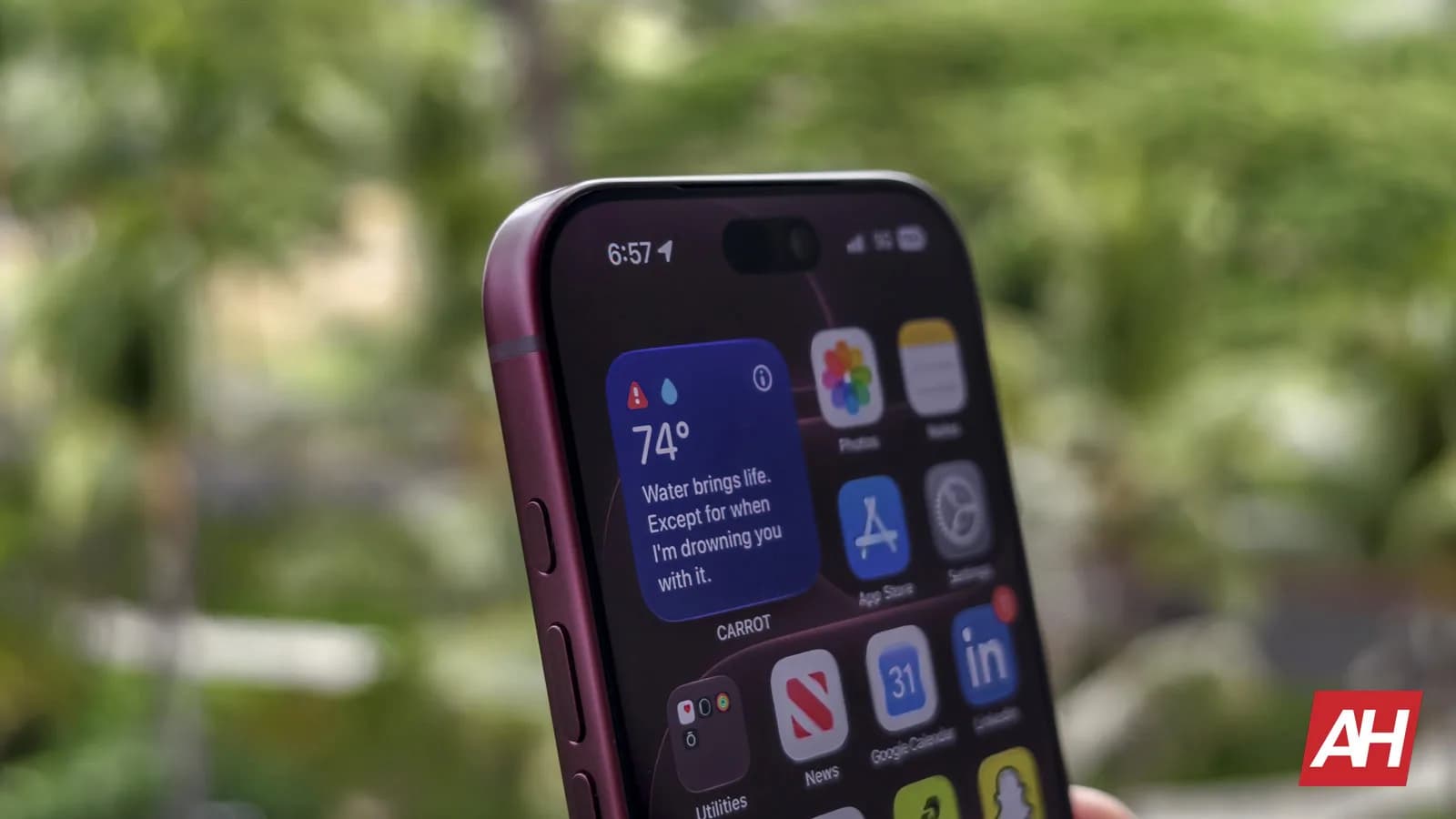Concept render of an iPhone with a fully curved display wrapping around all four edges, no visible bezels or frame