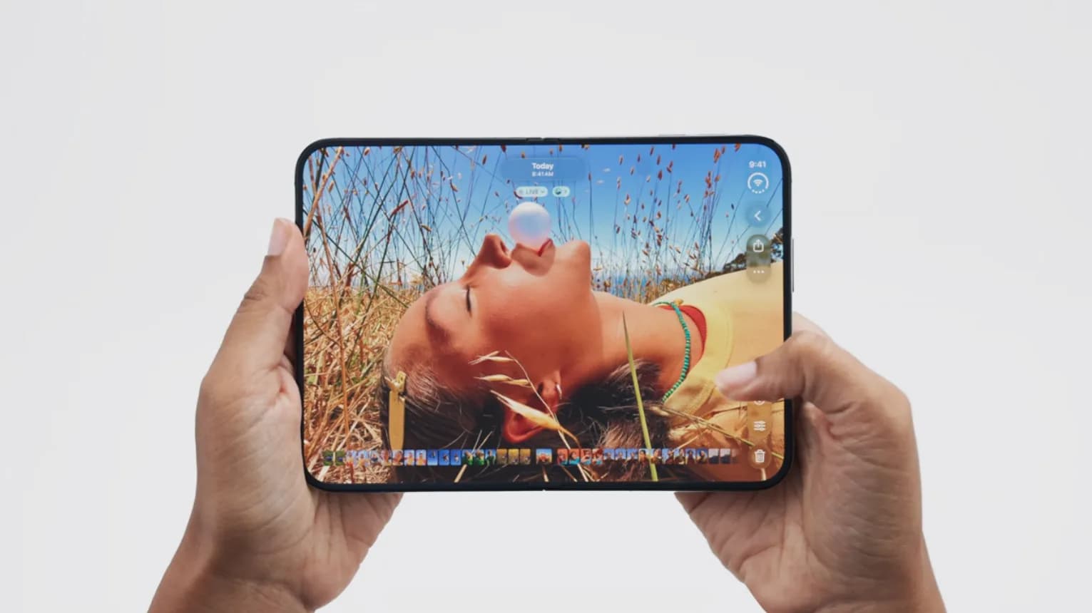 Apple iPhone Duo foldable smartphone shown alongside protective cases