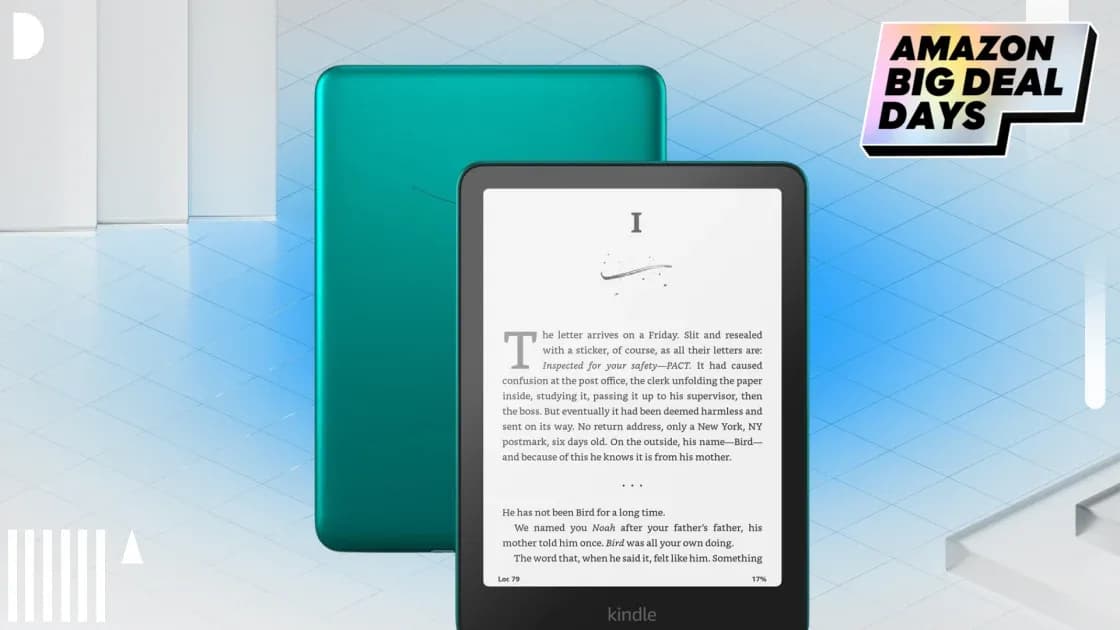 Amazon Kindle Paperwhite Signature Edition lying flat on a wooden table, screen displaying an open book, soft lighting