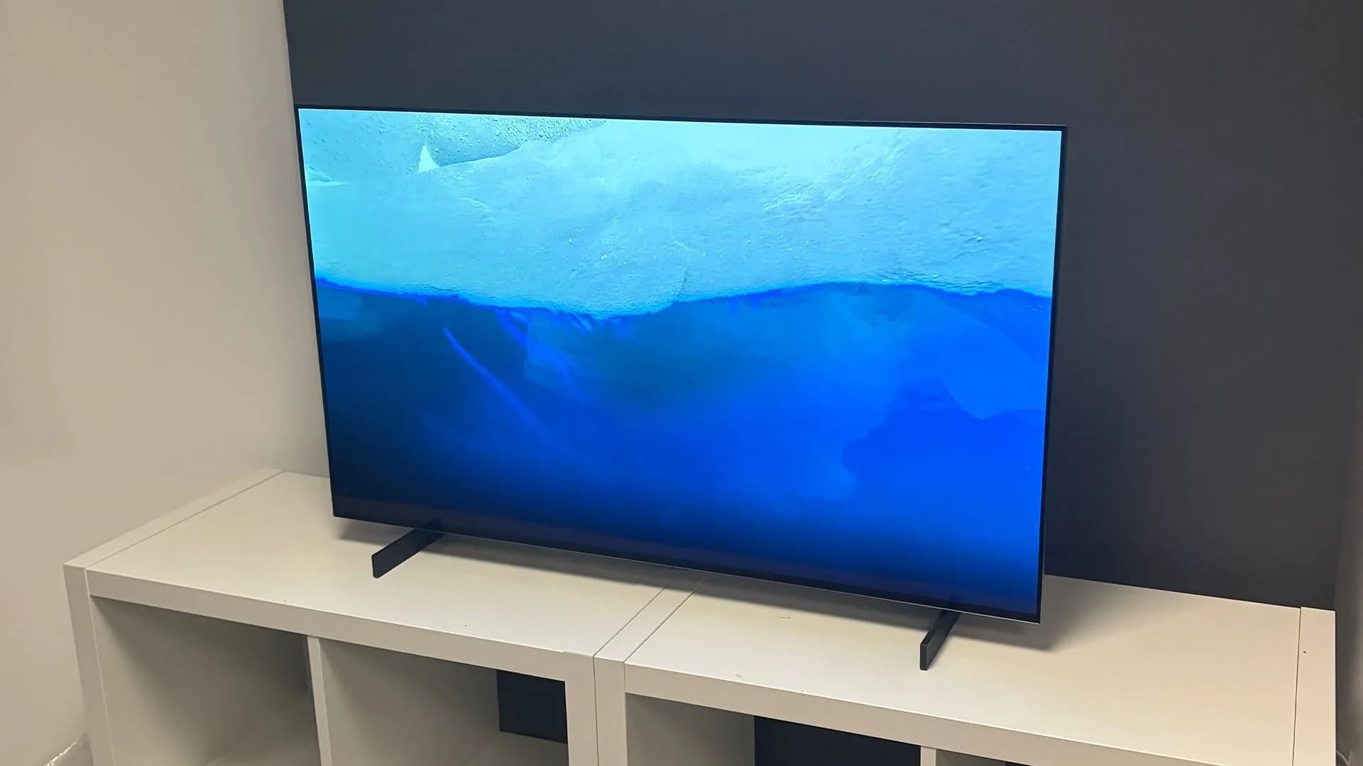 Front view of the 42-inch LG C6 OLED television sitting on its dual blade feet.
