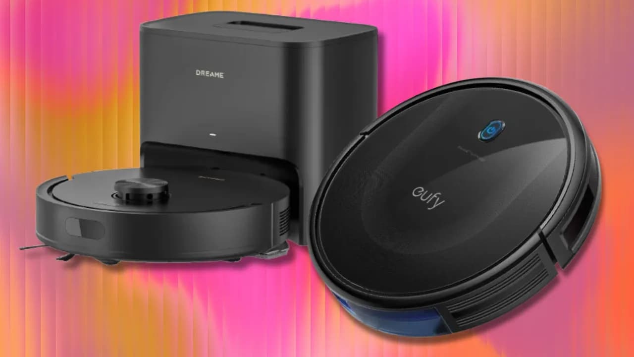 Robot vacuum cleaning a hardwood floor next to an automatic emptying base station