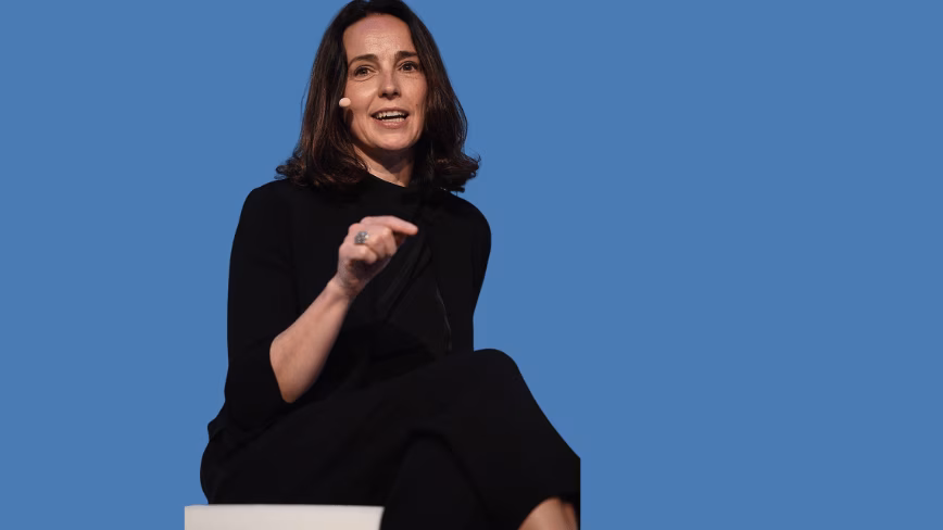 OpenAI chief financial officer Sarah Friar speaking on stage at a technology conference.