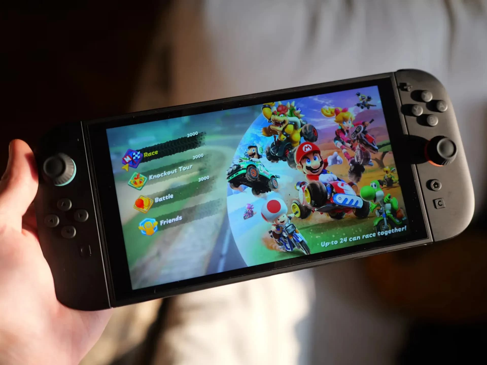 Nintendo Switch 2 console with its Joy-Con controllers attached on a plain background