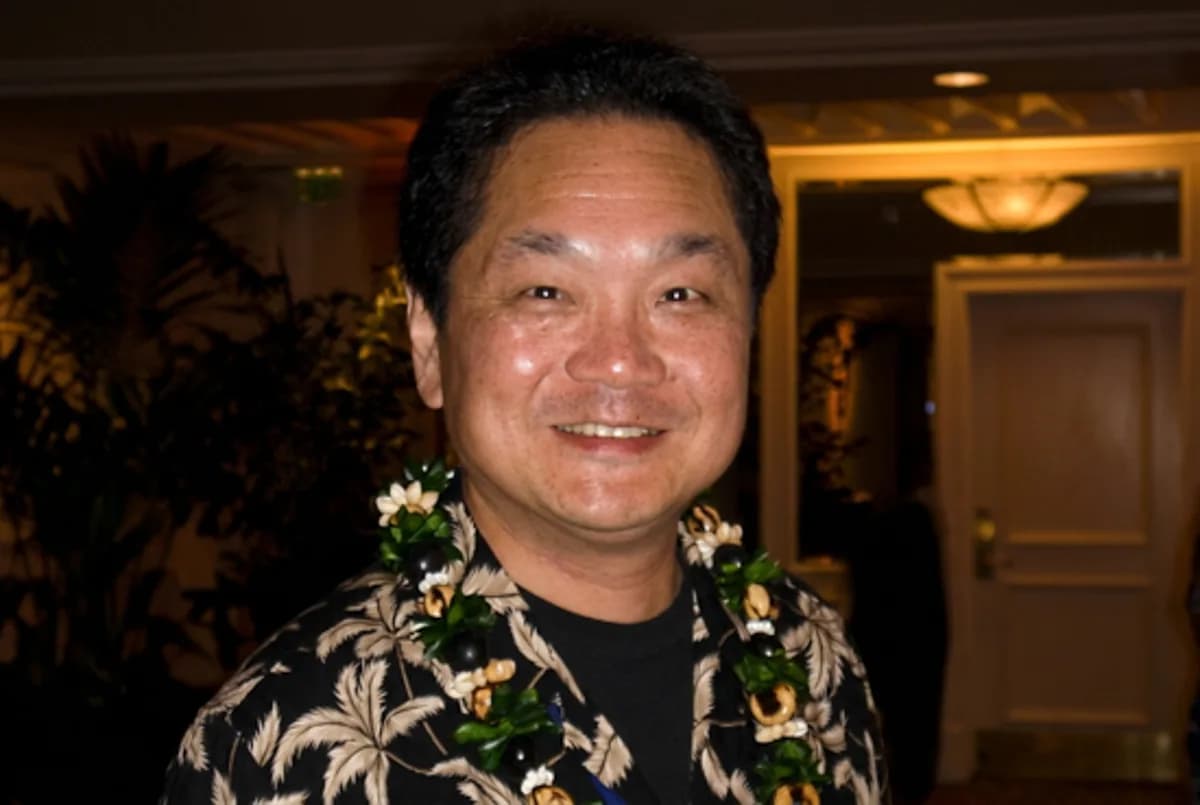 Ken Kutaragi speaking on stage about gaming hardware and entertainment technology