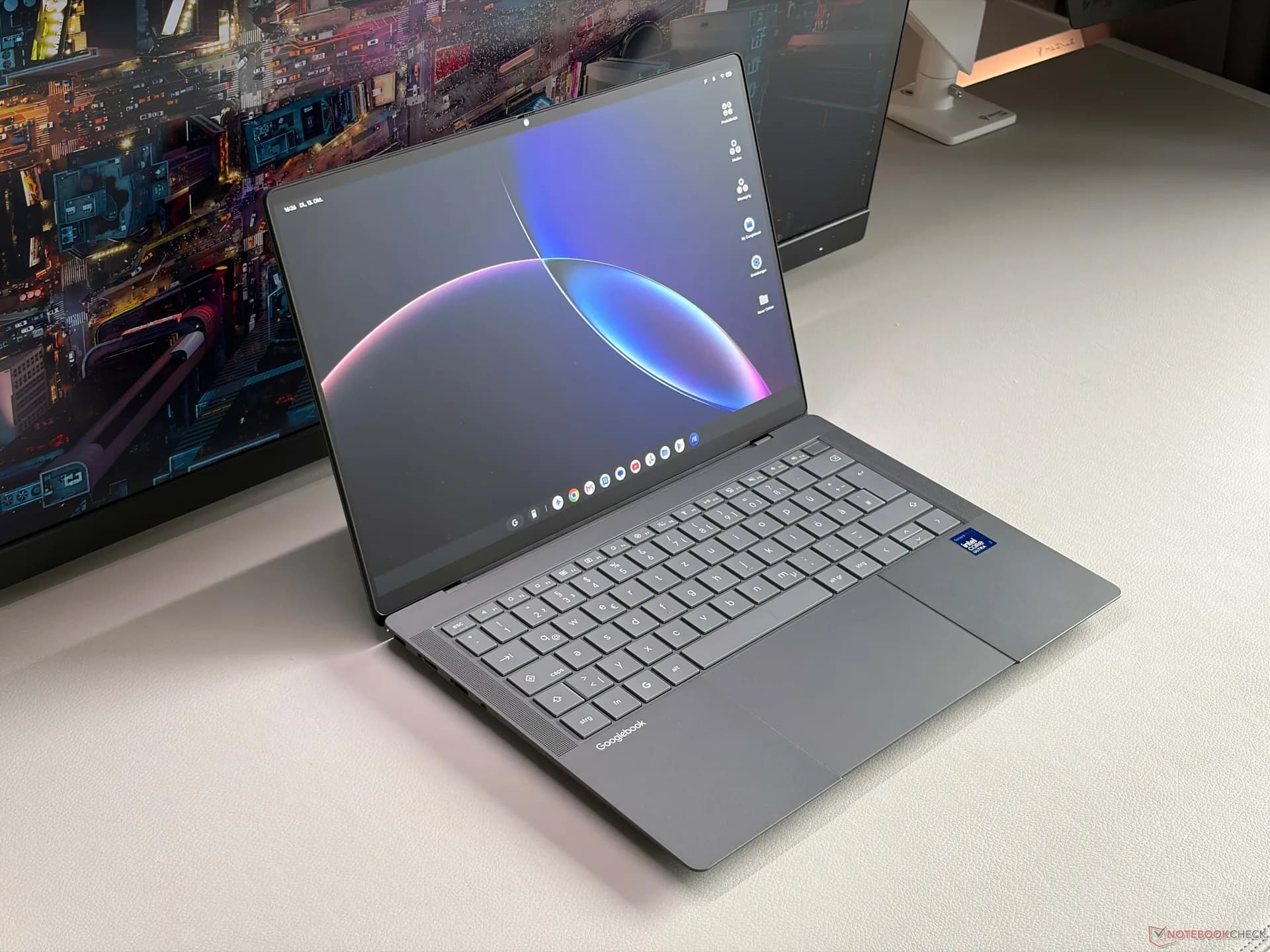 The Asus Googlebook 14 laptop resting open on a desk displaying its 14-inch matte screen.