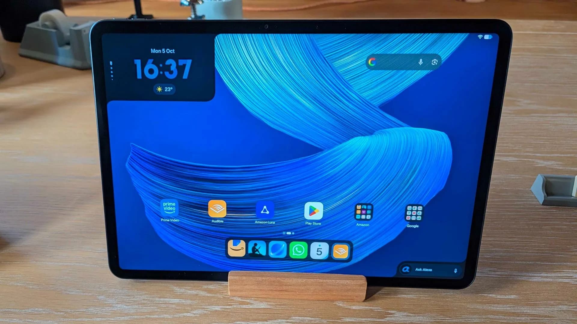 The Amazon Alexa Tablet 12 Pro showing its anti-glare display surface alongside optional keyboard and stylus accessories.