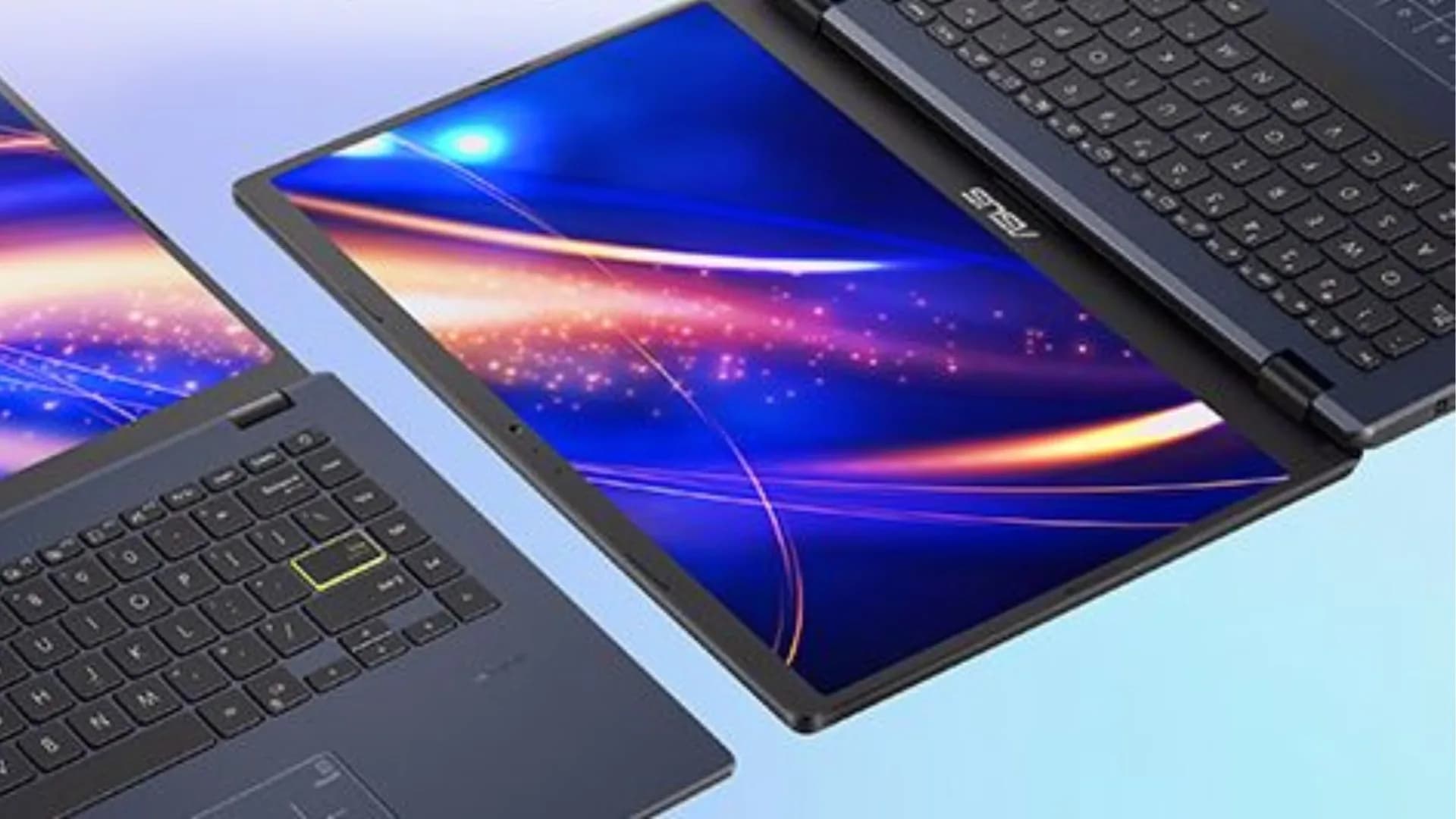 Asus L410 budget laptop open on a table showing its keyboard and display