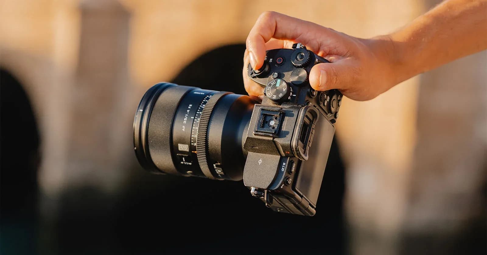 Viltrox AF 35mm f/1.4 Pro lens shown in matte black finish with aperture ring and focus switches visible.