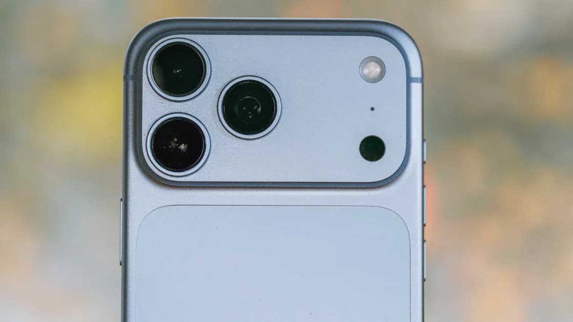 The rear triple camera module on an iPhone 18 Pro Max showing the main variable aperture lens.