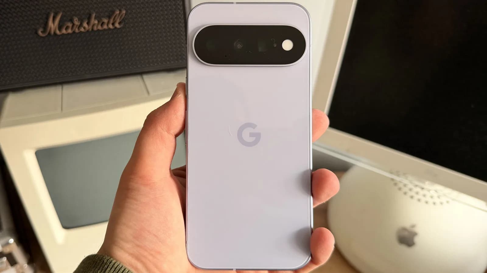 Google Pixel 11, Pixel 10, and Pixel 9 side by side on a white surface