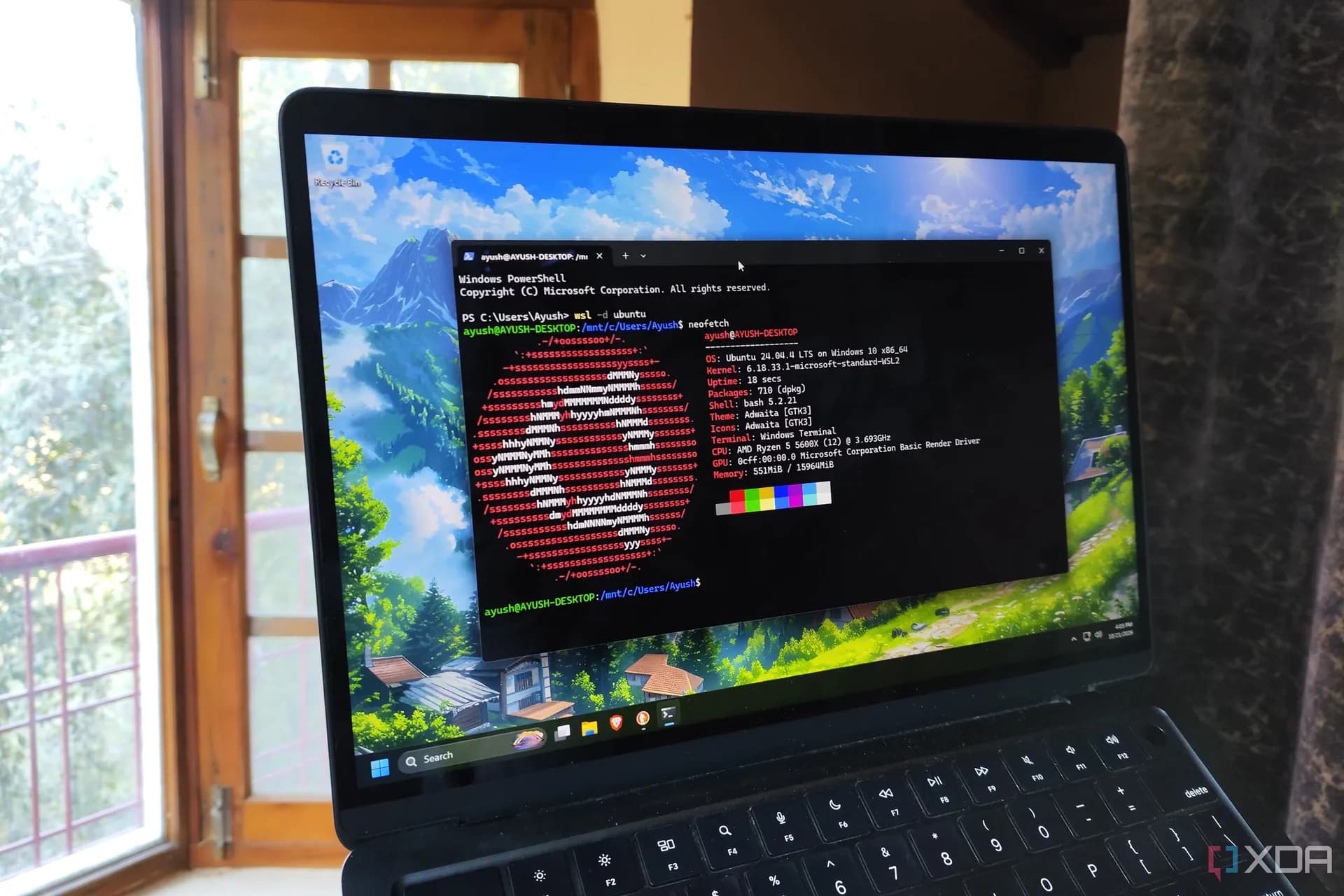 Windows 11 desktop running a terminal window and code editor through Windows Subsystem for Linux
