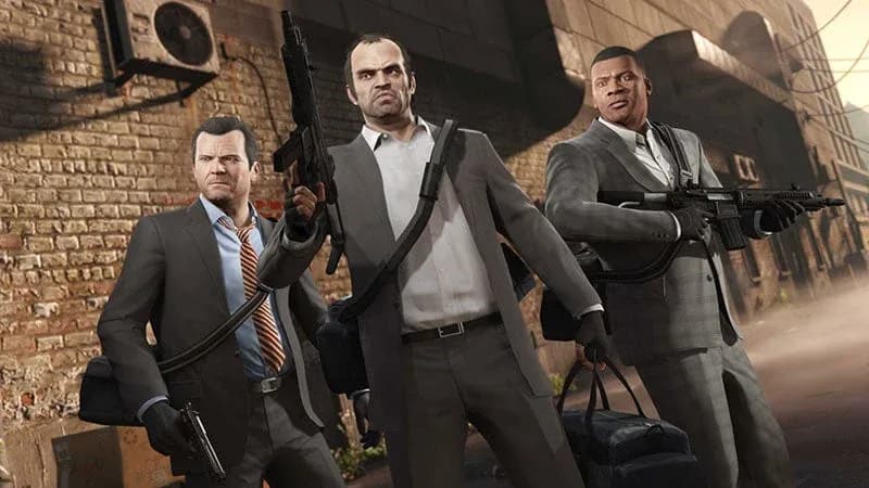 A PlayStation 5 controller beside a 'GTA VI Coming November 19' poster