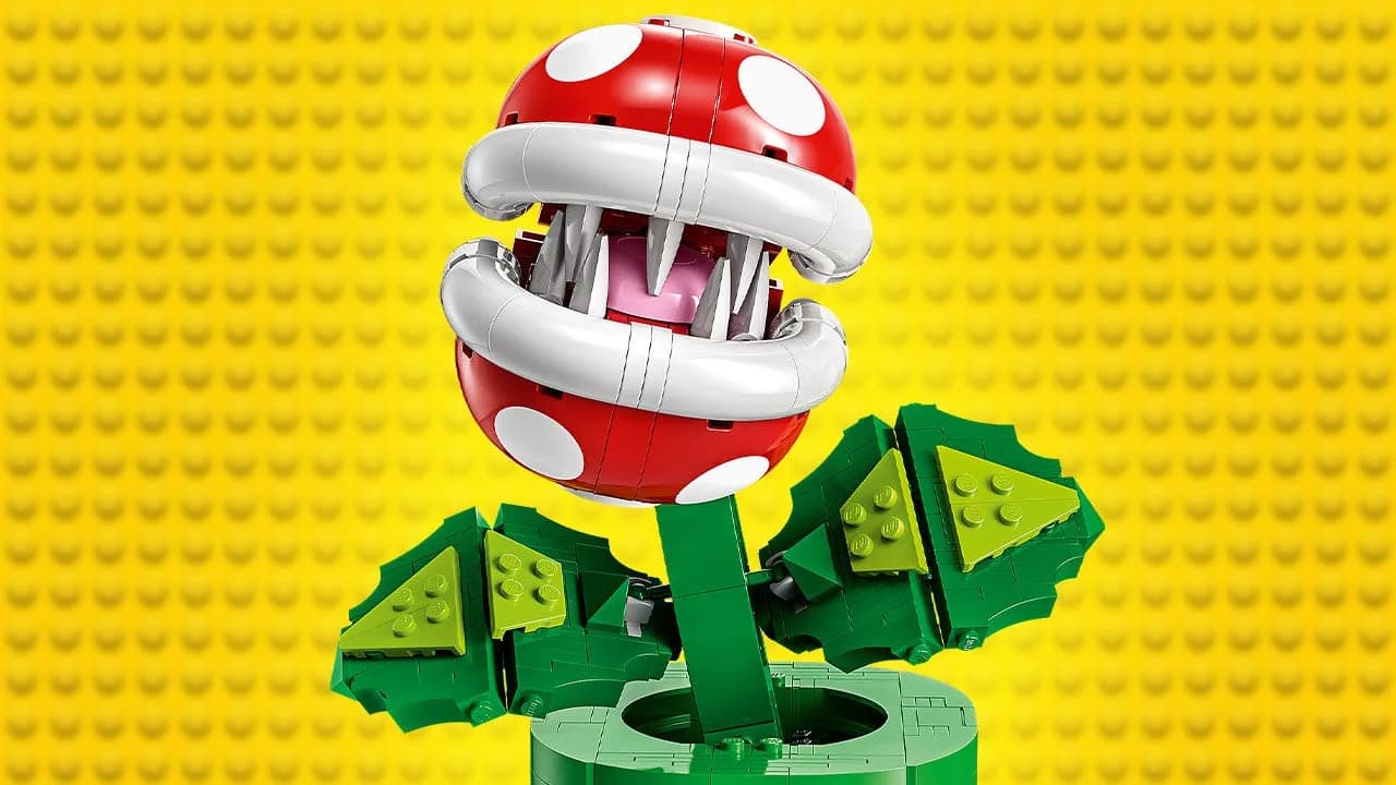 LEGO Super Mario Piranha Plant 71426 set assembled on a shelf, showing articulated mouth and pipe base with golden coins visible in piggy bank slot