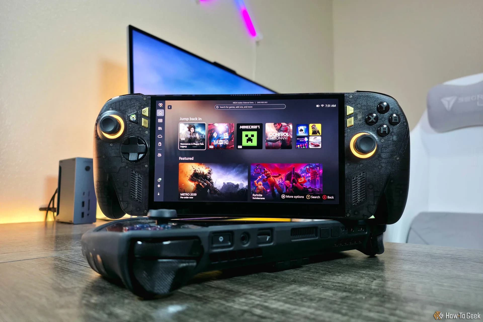 Xbox Ally X20 handheld in translucent casing, showing internal components, next to Pelican case and XREAL R1 AR glasses