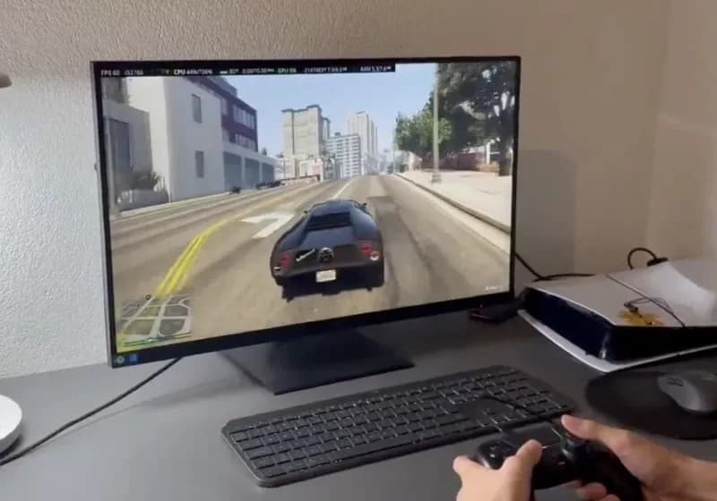 PlayStation 5 console standing upright beside a modern gaming desktop PC tower.