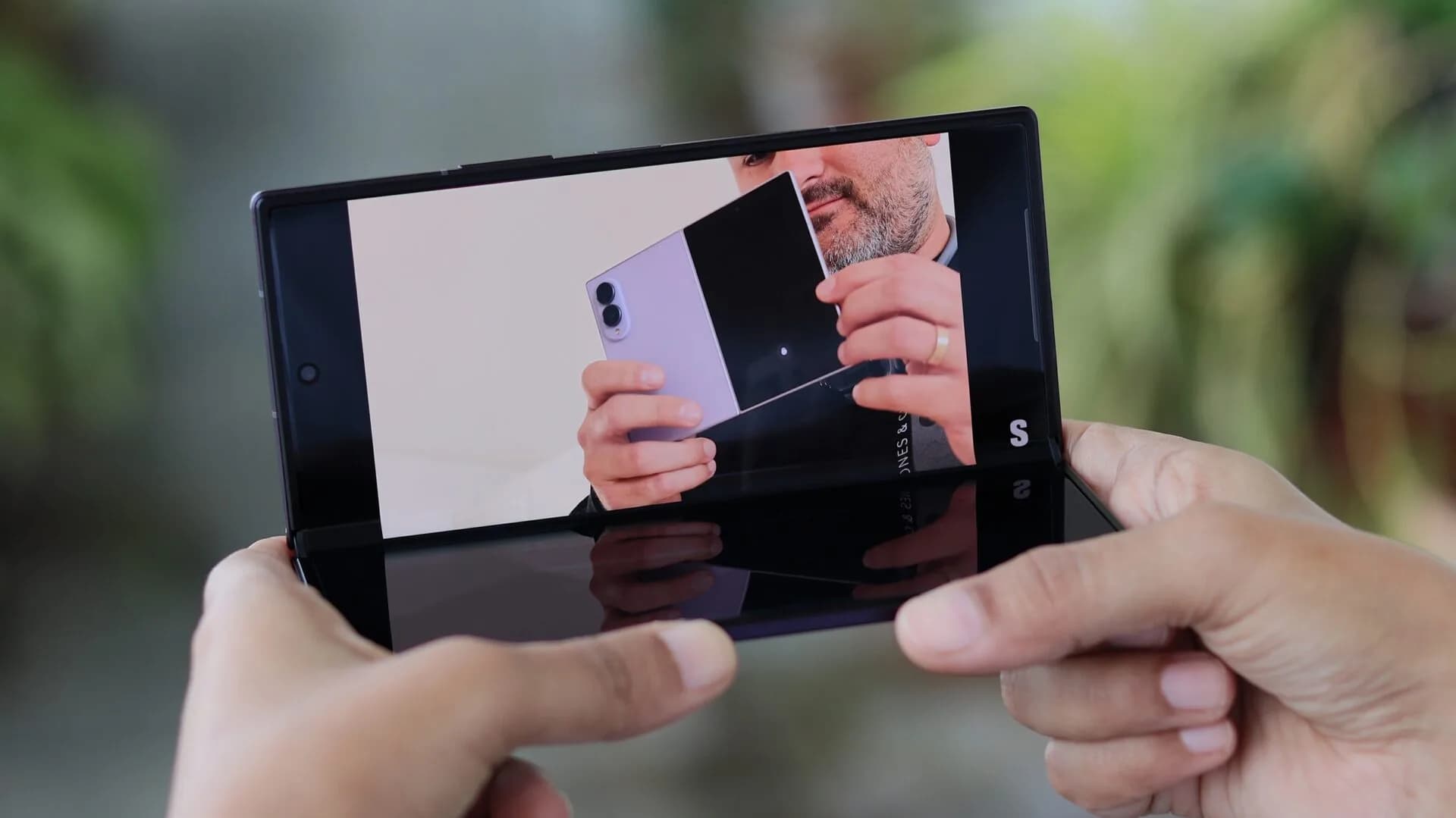 Samsung Galaxy Z Fold 8 Ultra shown partially unfolded next to the standard Galaxy Z Fold 8