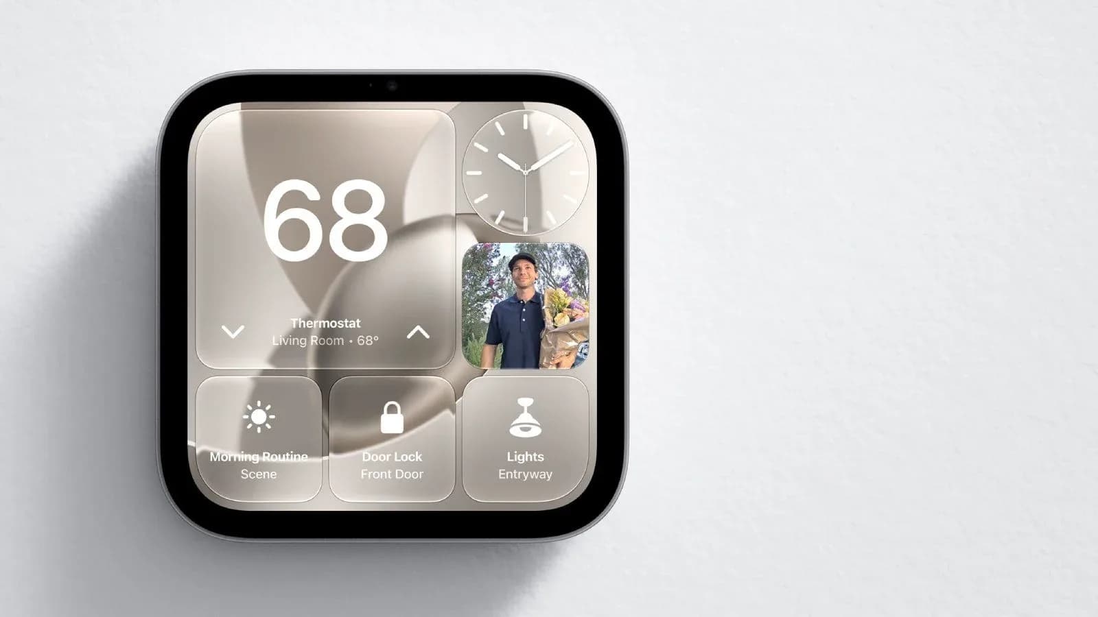 Apple HomeView smart display mounted on a wall inside a modern home.