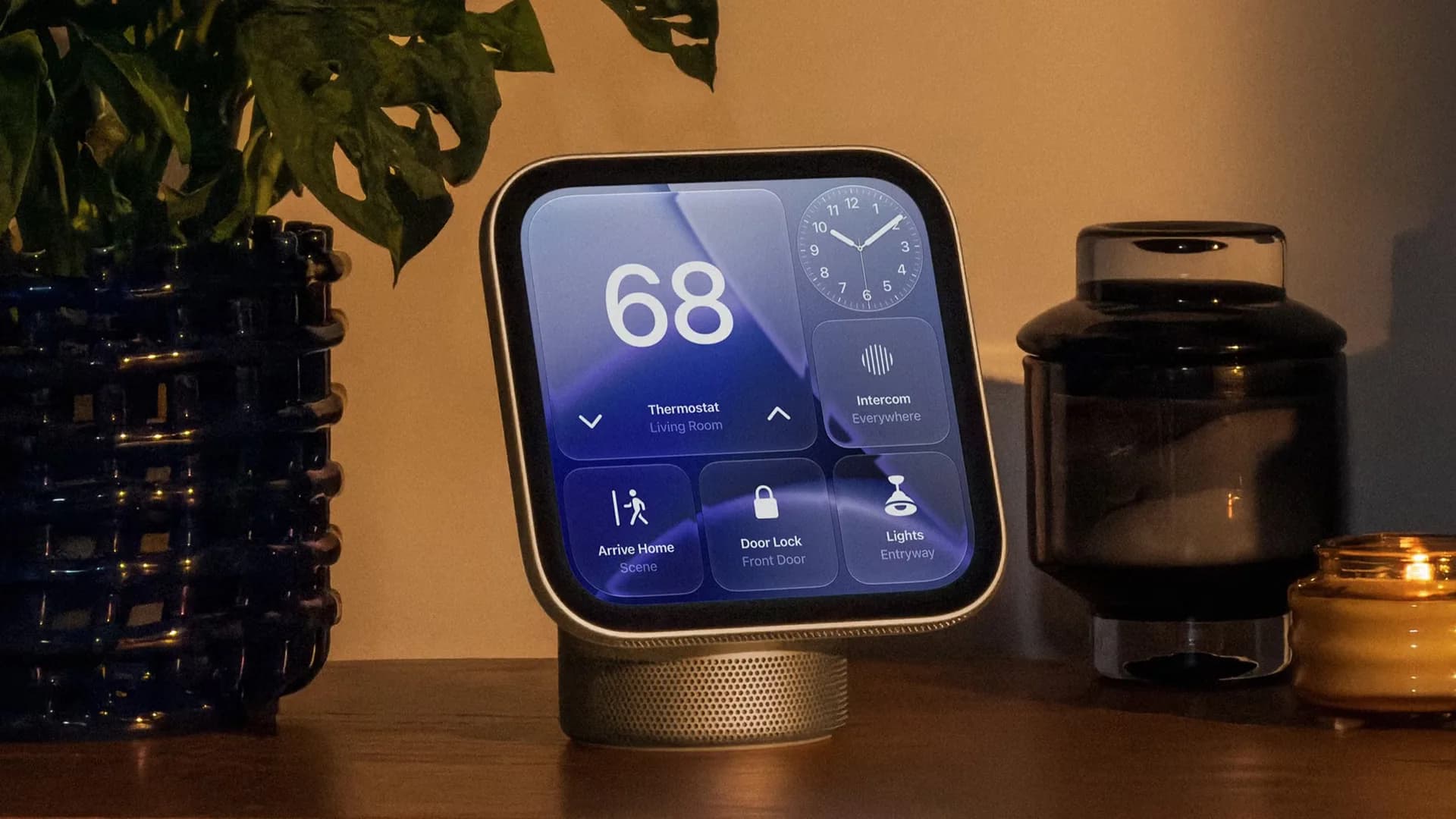 A smart display screen showing smart home controls on a kitchen counter