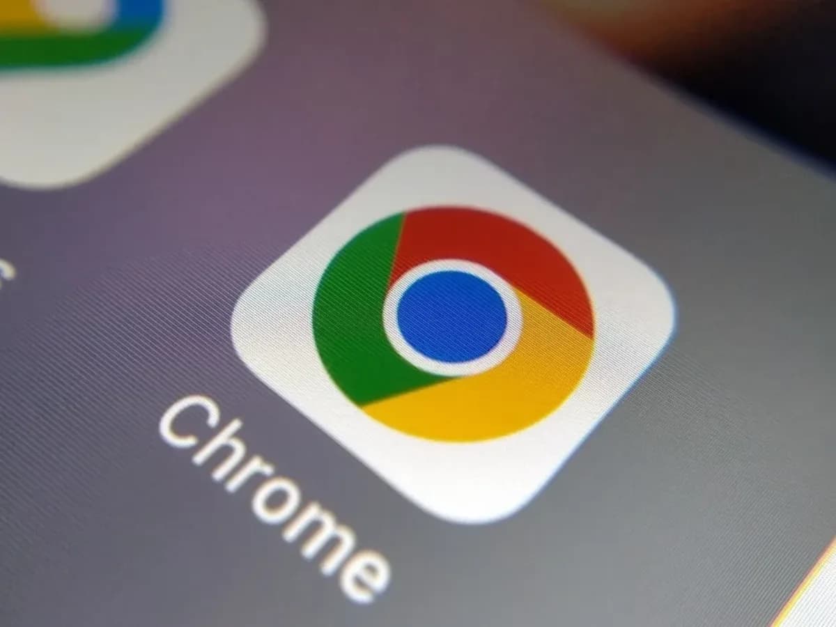 Google Chrome browser logo displayed on a laptop monitor next to security code.