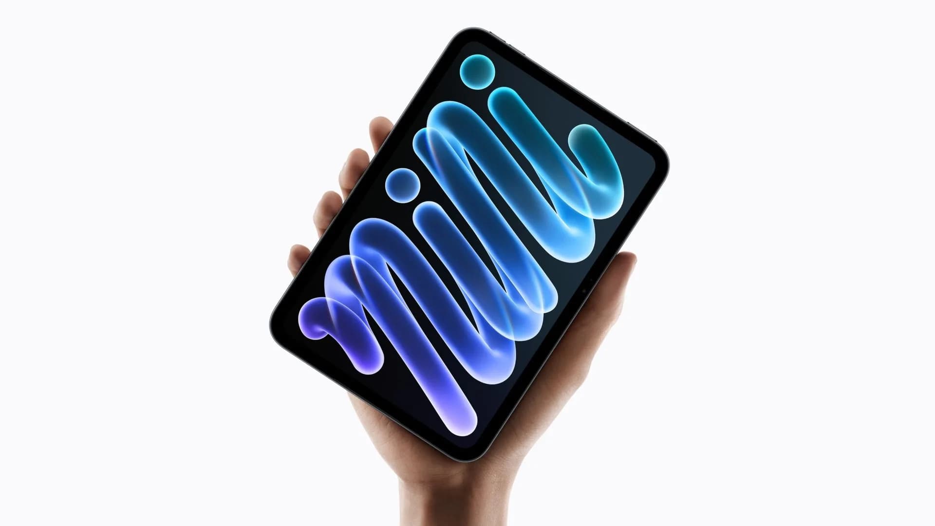 OLED iPad Mini showing a movie on a tray table during a flight