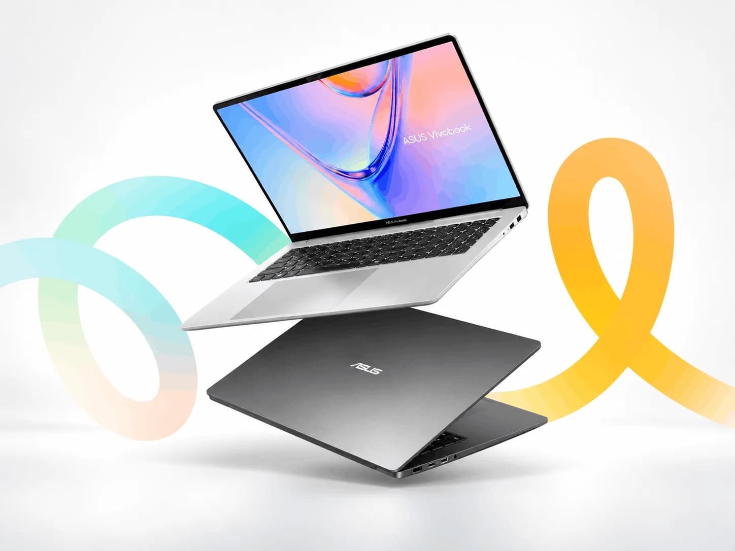 Asus Vivobook S14 and S16 side by side, matte silver chassis, thin bezels
