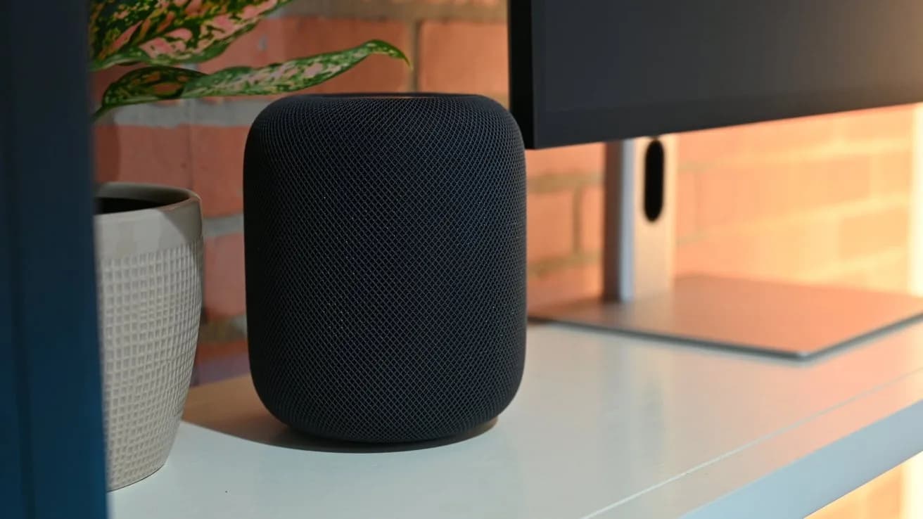 HomePod mini 2 next to an M3 MacBook Air, with Sound Glow active